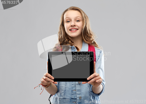 Image of student girl with school bag and tablet computer