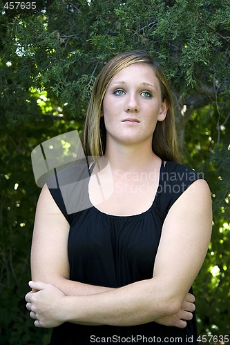 Image of Beautiful Girl in the Park in a Black Dress