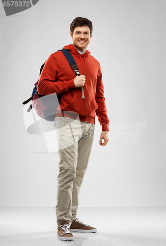 Image of young man or student with school bag or backpack