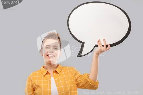 Image of red haired teenage girl holding speech bubble