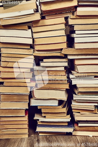 Image of Wall of books piled up