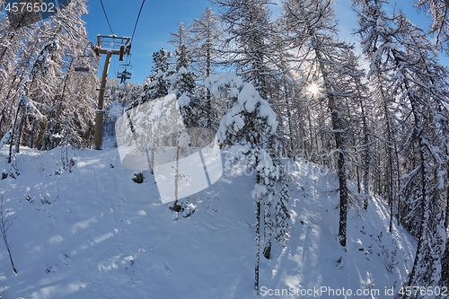 Image of Ski resort in the mountains, ski lift ascend