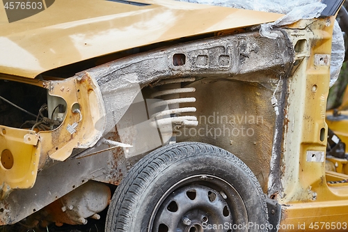 Image of Car Wreck with missing parts