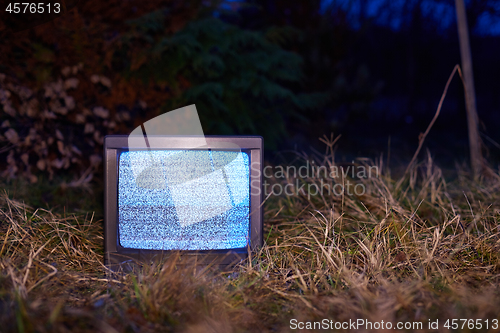 Image of TV no signal in grass