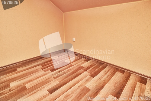 Image of Parquet floor interior empty room corner