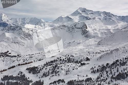 Image of Skiing slopes, majestic Alpine landscape with trees