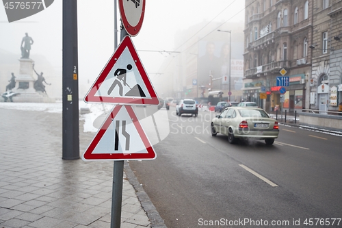 Image of Foggy city street with cars