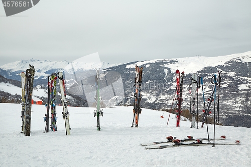 Image of Skis on top of the slopes