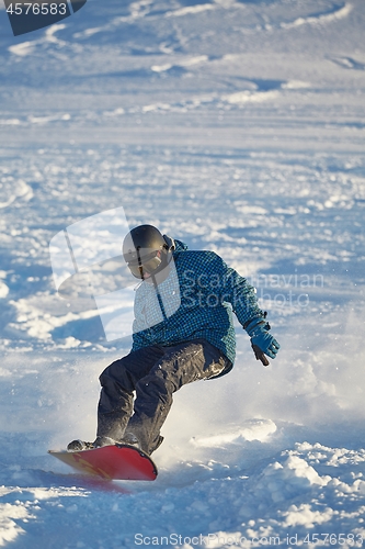 Image of Snowboarding in fresh powder snow