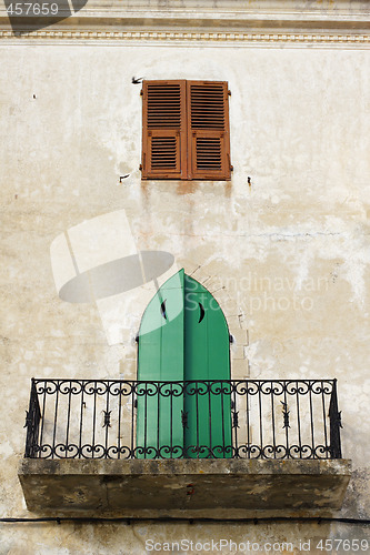 Image of traditional, town house balcony in Calvi Corsica