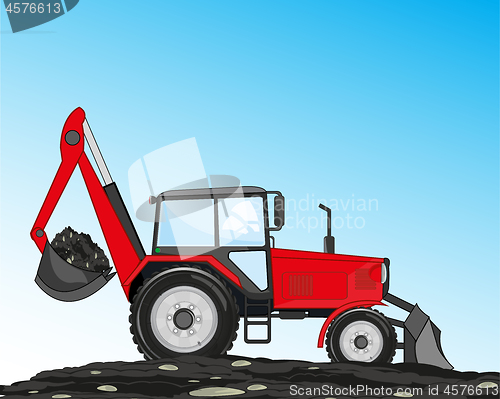 Image of Tractor with scoop and shovel digs land