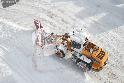 Image of Winter road clearing snowplow