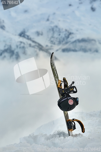 Image of Snowboard on a mountain top