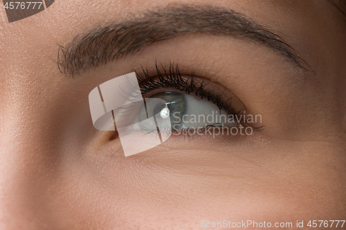 Image of The close up eyes on face of young beautiful caucasian girl