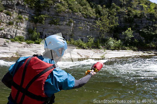 Image of kayak paddlers practising river rescues