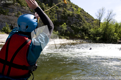 Image of kayak paddlers practising river rescues