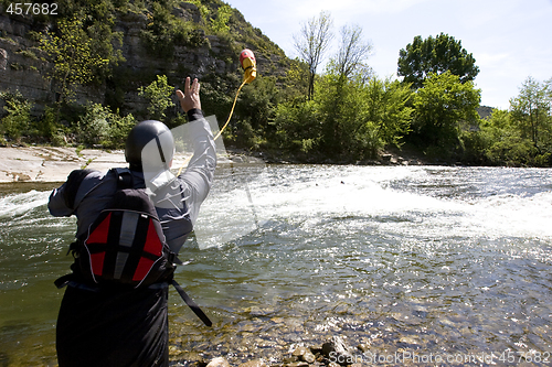 Image of kayak paddlers practising river rescues