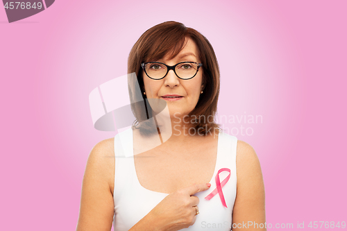 Image of old woman with pink breast cancer awareness ribbon