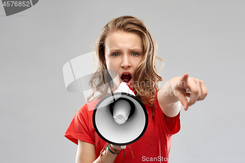 Image of angry teenage girl speaking to megaphone