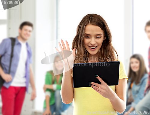 Image of teenage girl having video call on tablet computer