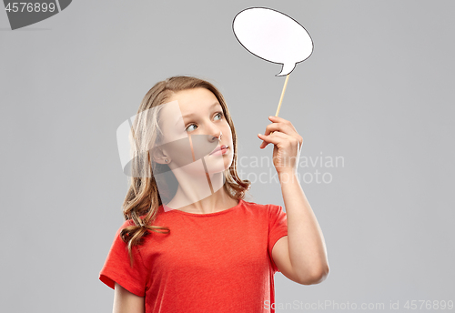 Image of teenage girl holding blank speech bubble