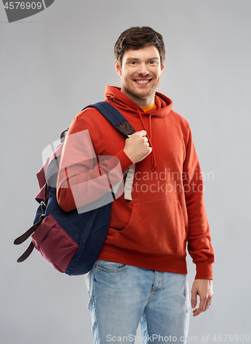 Image of young man or student with school bag or backpack