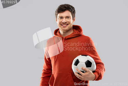 Image of happy man or football fan with soccer ball