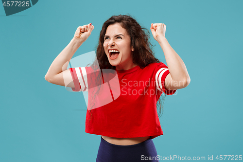 Image of Winning success woman happy ecstatic celebrating being a winner. Dynamic energetic image of female model