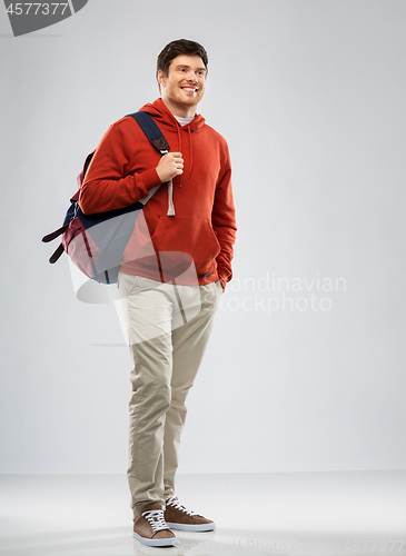 Image of young man or student with school bag or backpack