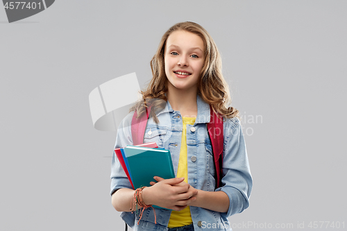 Image of happy smiling teenage student girl with school bag