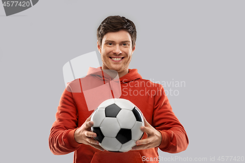 Image of happy man or football fan with soccer ball