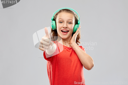 Image of happy teenage girl with headphones