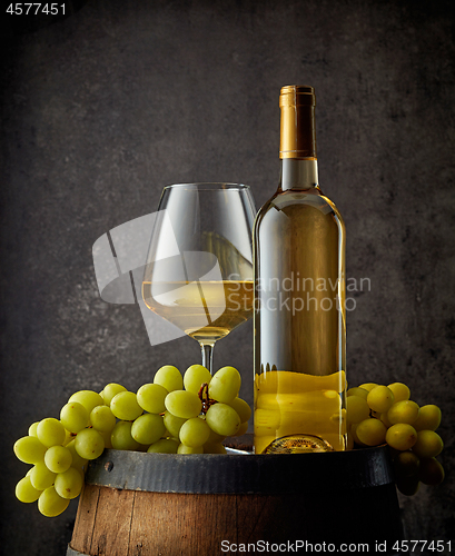 Image of glass and bottle of wine