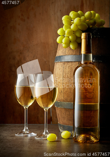 Image of bottle and two glasses of white wine