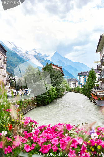 Image of Arve river, buildings of Chamonix and Mont Blanc Massif