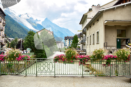 Image of Arve river, buildings of Chamonix and Mont Blanc Massif