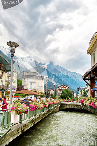 Image of Arve river, buildings of Chamonix and Mont Blanc Massif