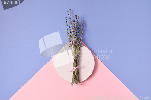Image of Branch of lavender on a round plate.