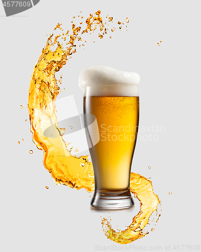 Image of Class of light beer with splashing wave.