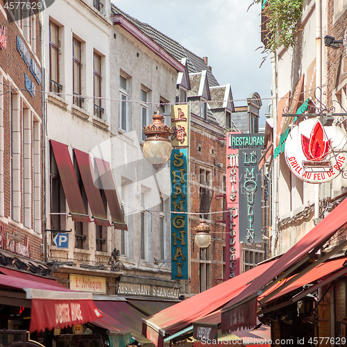 Image of small alley with many restaurants in Brussels, Belgium