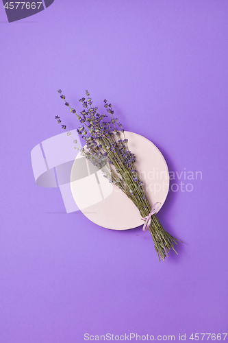 Image of Organic lavender bunch on a ceramic plate.