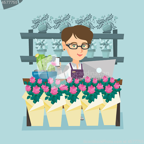 Image of Florist standing behind the counter at flower shop