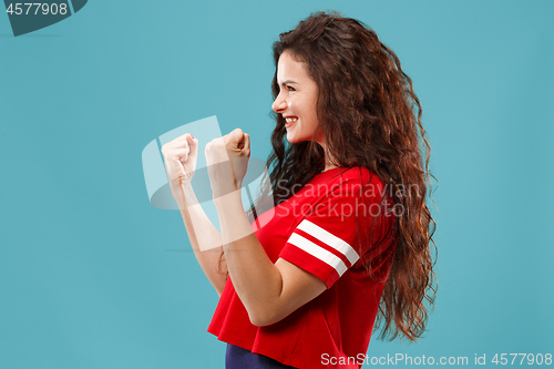 Image of Winning success woman happy ecstatic celebrating being a winner. Dynamic energetic image of female model