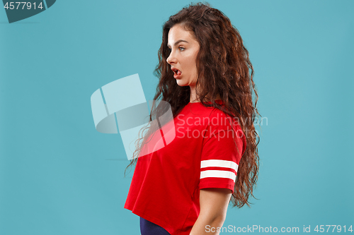 Image of Beautiful woman in stress isolated on blue