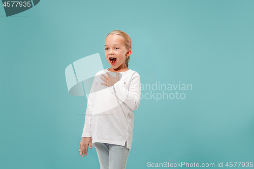 Image of Happy young beautiful girl singing isolated on blue background