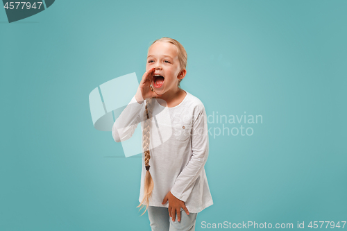 Image of Isolated on pink young casual teen girl shouting at studio