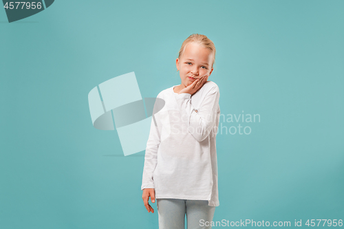 Image of Young girl is having toothache.