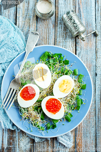 Image of eggs with red salmon caviar