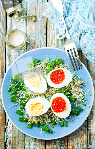 Image of eggs with red salmon caviar