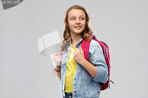 Image of happy smiling teenage student girl with school bag